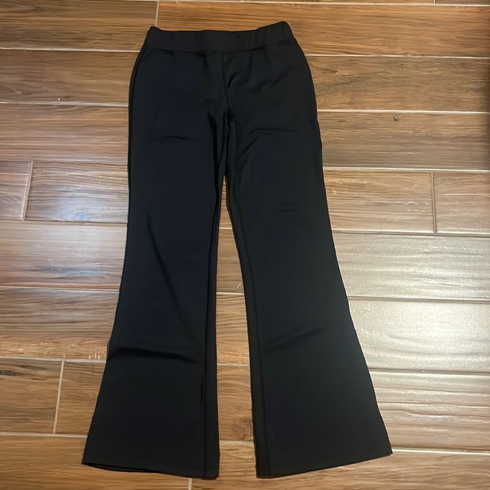 Basic black flare leggings in an adult medium